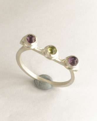 handmade silver ring with peridot and amethyst